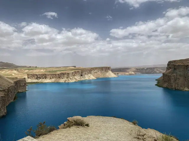 The blue water of Band-e-Amir between its cliffs
